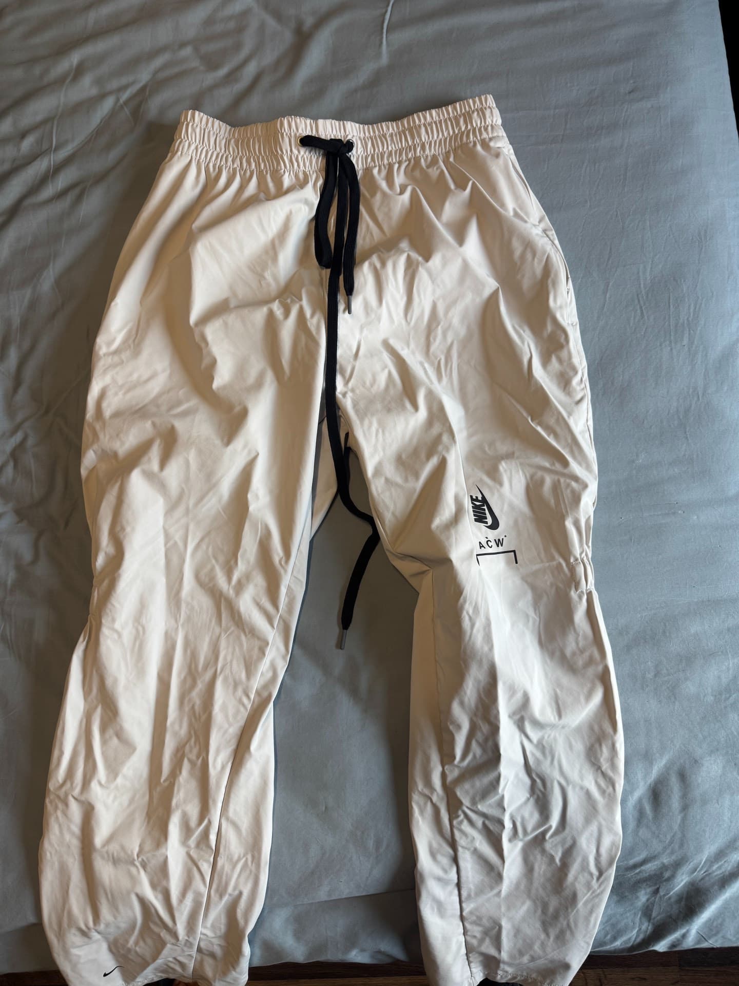 кобрендовые брюки acw nike