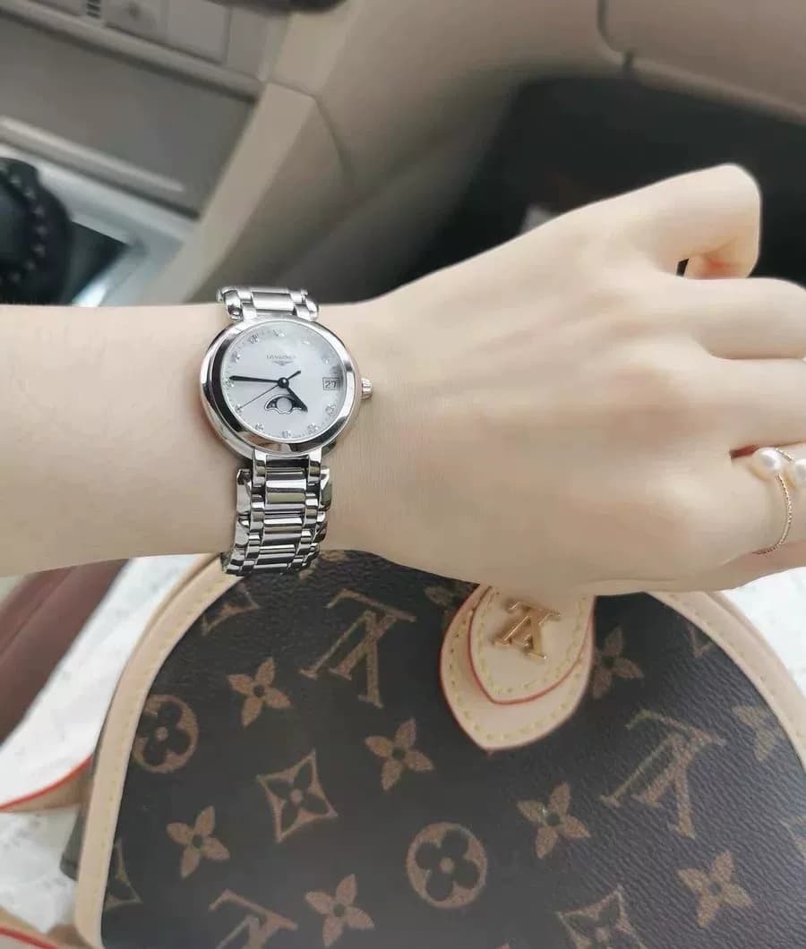 Женские часы Longines Qinyue, которые я купила в этом году, с ремешком из нержавеющей стали, циферблатом диаметром 30,5 мм и бриллиантовой шкалой.,